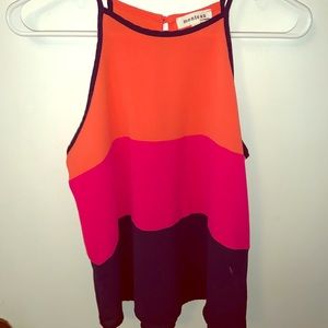 Medium sized boutique tank! Fits more like a small